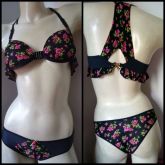 conjunto preto com rosinhas tamanho p